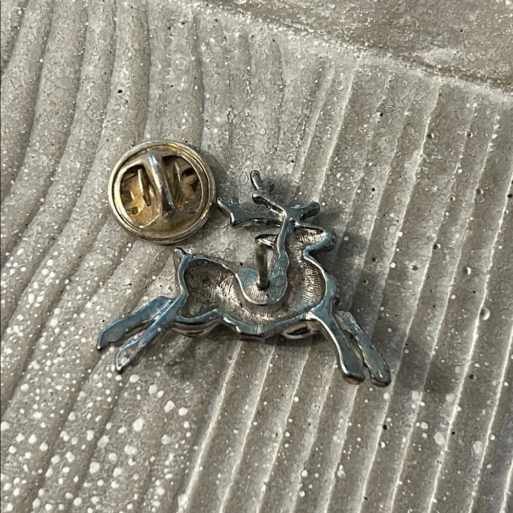 Avon Reindeer pin Christmas silvertone reindeer with red enamel brooch